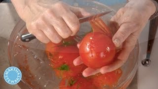 How to Peel Tomatoes  Martha Stewarts Cooking School [upl. by Nemracledairam]