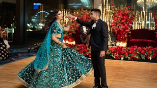 INDIAN WEDDING RECEPTION DANCE l BRIDE AND GROOM ENTRANCE l SABYASACHI BRIDE [upl. by Carthy]