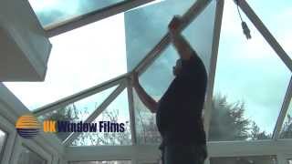 Installing window film on a shaped glass conservatory roof [upl. by Elleral]