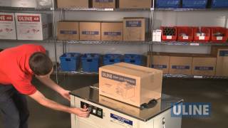 Uline H2079 SemiAutomatic Poly Strapping Machine  Demonstration [upl. by Mic]