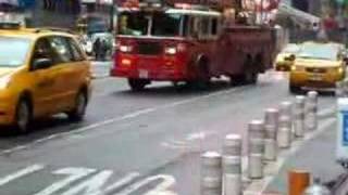 fdny engine 33 325 ladder 24 ambulance on times square [upl. by Elrebmik]