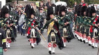 Huntly and District Pipe Band marching to the 2022 Braemar Gathering in Royal Deeside Scotland [upl. by Tarabar]