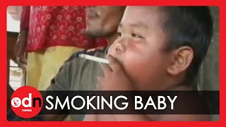 Indonesian baby smokes 40 cigarettes a day [upl. by Asiled965]