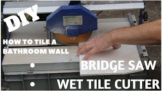 How to Tile a Bathroom Wall  Bridge Saw Tile Cutter DIY Part 4 [upl. by Ecirtnom646]