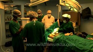 Surgeons preparing for Fibrocystic breast surgery [upl. by Ofella]