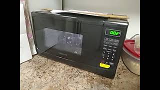 Farberware Compact Countertop Microwave Oven 07 Cu Ft 700Watt with LED Lighting Child Lock Ea [upl. by Ahsatsana]