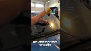 Heat shrinking front windshield tint windowtint maxprowindowfilms tint diy [upl. by Noakes679]