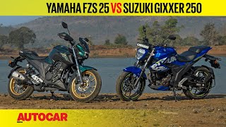 BS6 Yamaha FZS 25 vs Suzuki Gixxer 250  Word on the street bikes is  Comparison  Autocar India [upl. by Burd]