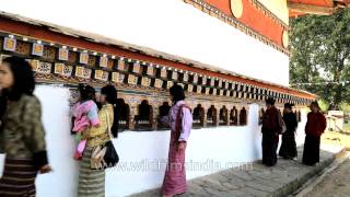 Chimi Lhakhang  women pray at the temple of fertility [upl. by Eahs183]