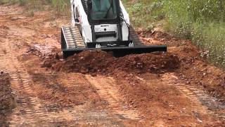 Skid Pro Skid Steer 6 Way Dozer Blade Demo [upl. by Llorre]