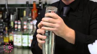 Mixology School  How to make a Cosmopolitan [upl. by Unhsiv]