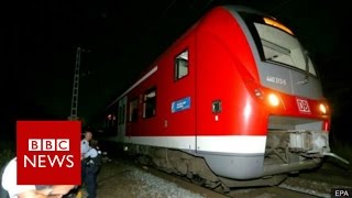 German train attack Afghan refugee had IS flag in room  BBC News [upl. by Soisanahta]