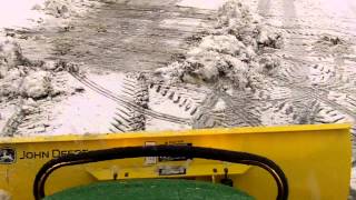 John Deere X300 Snowplowing Heavy Wet Snow [upl. by Mot815]