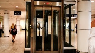 Epic Priceless amp Amazing inground hydraulic glass elevators  Montreal Trudeau Airport YUL [upl. by Nuriel]